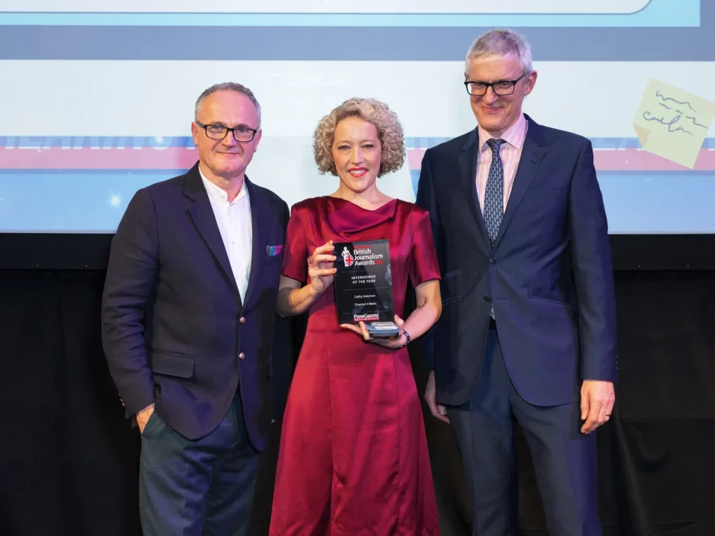 Cathy Newman picks up the Interviewer of the Year prize from Rob McGibbon and Jeremy Vine at the British Journalism Awards 2025. Picture: Press Gazette/Adam Duke Photography