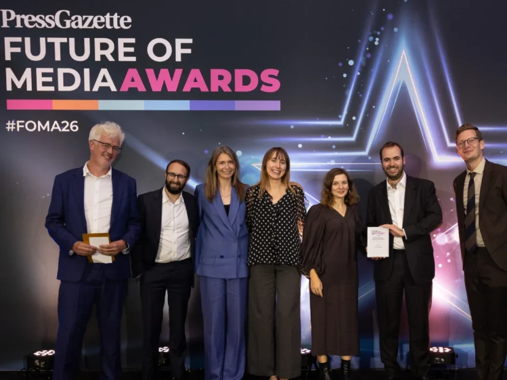 The team from The Times picking up the Website of the Year (National/International) award at the Future of Media Awards 2026 from freelance journalist Rob Waugh (far left) and host Robin Morgan (far right)