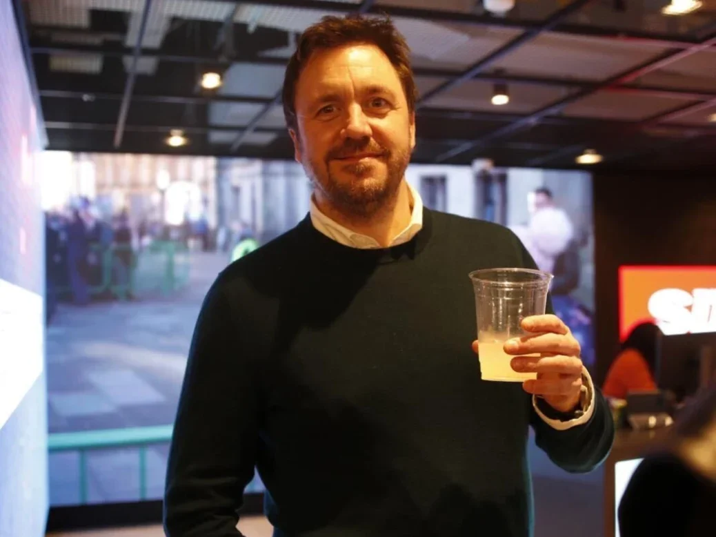 Paul Vale, pictured in a bar holding a drink