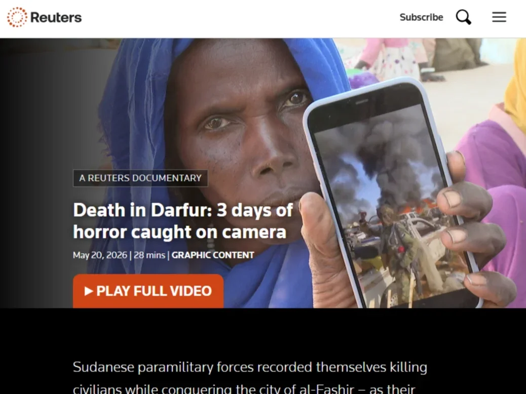Screenshot of homepage for new Reuters documentary: Death in Darfur - 3 days of horror caught on camera, with large play button and graphic content warning